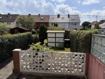 Terrassenansicht - Dach und Heizung erneuert: Gemütliches Reihenhaus in Sarstedt