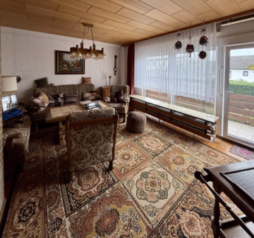 Wohnzimmer im EG - Verklinkertes 2-FH in Fertigbauweise mit Vollkeller auf tollem Grundstück in ruhiger Lage in Velber