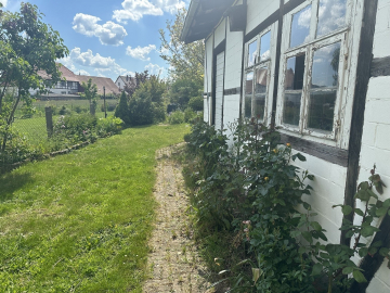 Sibbesse-Adenstedt: Großzügige Doppelhaushälfte mit Sauna, Balkon und Garage - Seitenansicht Anbau