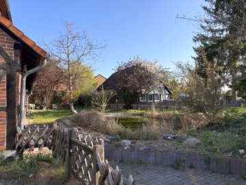 Garten - Wathlingen: Mehrfamilienhaus mit vier Wohneinheiten