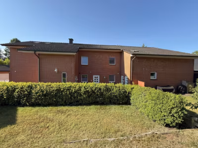 Attraktive Kapitalanlage in Hambühren: Mehrfamilienhaus mit 6 Wohneinheiten und 8 Garagen, 29313 Hambühren, Mehrfamilienhaus