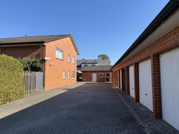 Bild - Attraktive Kapitalanlage in Hambühren: Mehrfamilienhaus mit 6 Wohneinheiten und 8 Garagen