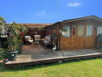 Gartenhaus - Ilsede-Ölsburg: Bungalow mit Keller und Doppelgarage auf einem traumhaften Grundstück