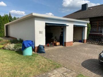 Solides Zweifamilienhaus mit Vollkeller und Doppelgarage in ruhiger Wohnlage von Seelze OT Lohnde - Garage