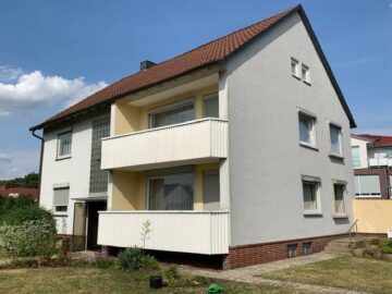 Solides Zweifamilienhaus mit Vollkeller und Doppelgarage in ruhiger Wohnlage von Seelze OT Lohnde - Rückansicht