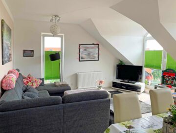 Wohnzimmer - Top modernisierte Eigentumswohnung in der Burgdorfer Weststadt