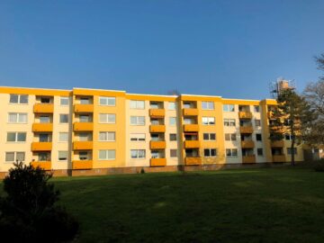 Rückansicht des Hauses - Großzügige 4-Zimmer-Mietwohnung in Hannover-Bothfeld